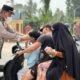 Perduli Kesehatan Warga di Tengah Asap Karhutla, Polsek Balikpapan Timur Bagikan 500 Masker